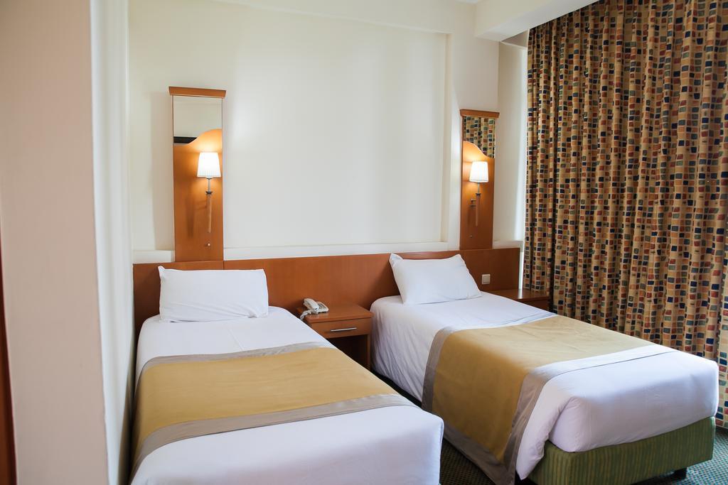 Gorillas City Centre Hotel Кигали Стая снимка